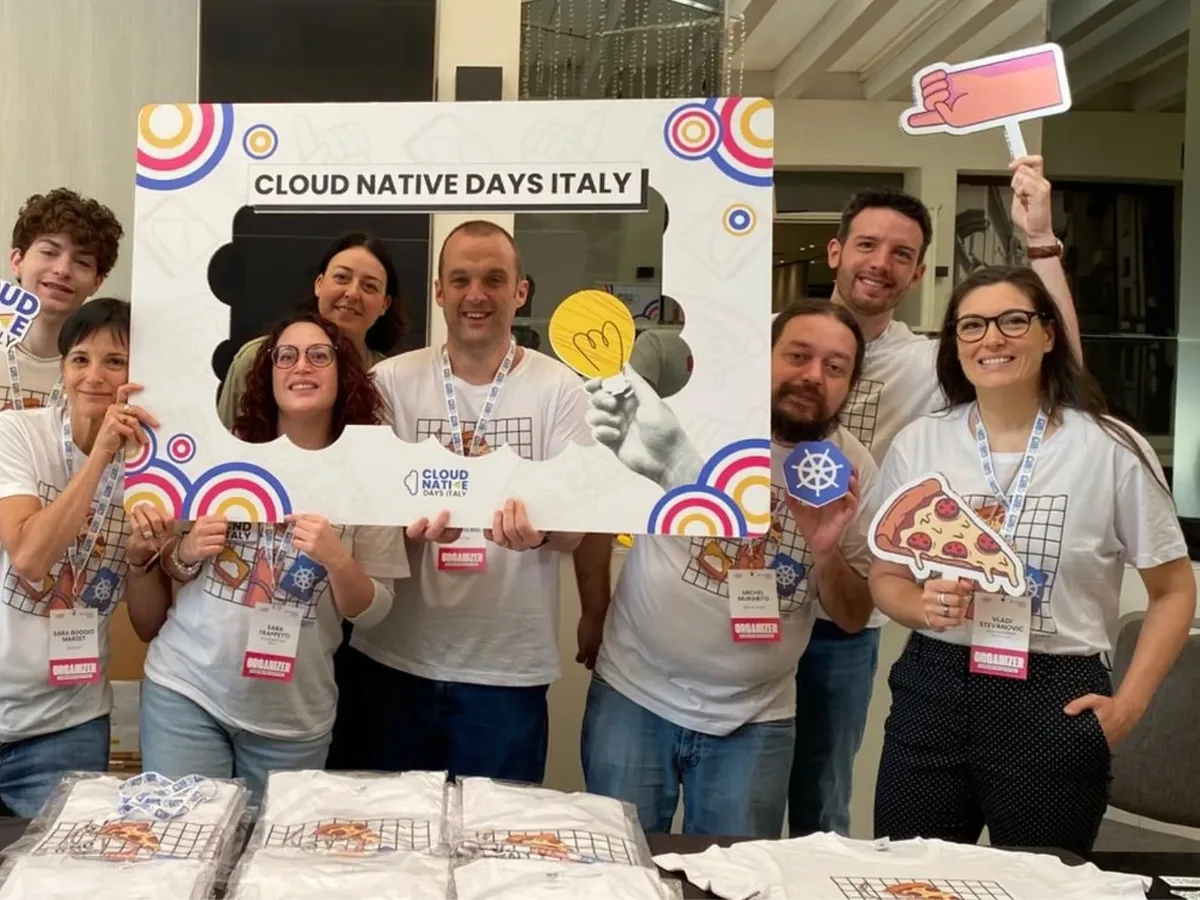 Organisers behind the photo frame at the welcome desk